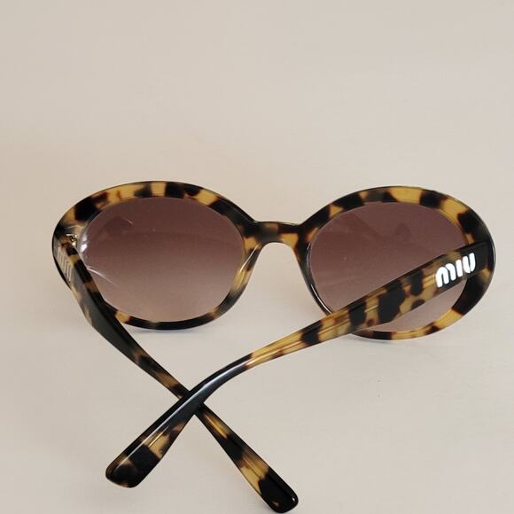 MIU MIU SMU 01U 7SO-QZ9 53x19x140 Oval sunglasses with case - Picture 4 of 11